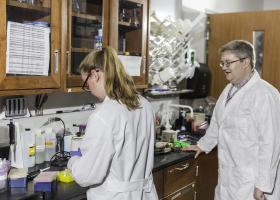 Sharp (right) in his lab with former NMU Lundin Honors Summer Research Fellow Maggie Bohm.