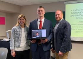 Smith (center) after successfully completing the NMU EdS pathway into the Central Michigan University EdD program in February 2020