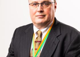 Brunswick wearing the Sam M. Cohodas Endowed Professorship medal