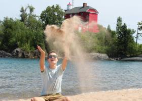 Chicka by the Marquette Harbor Lighthouse (Facebook photo)