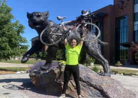 Stypulkowska in front of the Wildcat statue on campus