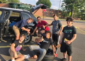 Olson (back left) and his teammates