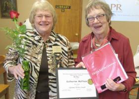 Debra Pajula, left, co-president of Beta Sigma Chapter, with Kay Mattson, the DKG Michigan State Organization’s Lifetime Service Award recipient (Iron Mountain Daily News photo)