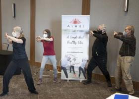 Vainio (far left) doing an Asahi demonstration at the NMU Health Fair
