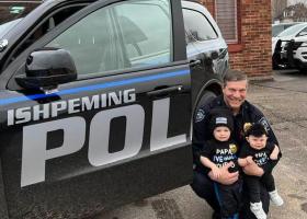 Snowaert with his granchildren (and future Wildcats) Beckham and Harlow Bunting.