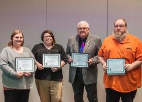 (from left) Attending team members Loehr, Belles, Hanson and Eagle