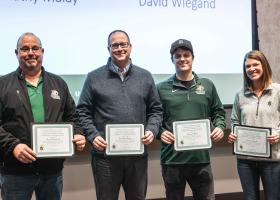 Team members Weigand, Sager, O'Neill and Emigh