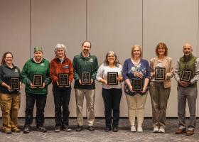 Excellence in Service Award winners (from left) Hegmegee, Ross, Sproull, Laxo, Mankee, Demboski, Thurston and Hamel