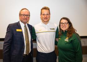 NMU Board Chair Steve Young with Zach and Head Coach Heidi Voigt