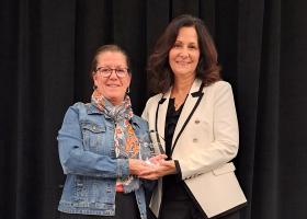Rochester (left) with Jeri Beggs, FAR at Illinois State, who presented the award.
