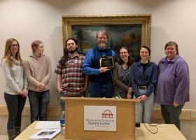 Central U.P. and NMU Archives representatives at the award ceremony (from left): Samantha Pynnonen, student employees Aura Wahl-Piotrowski and Elijah Croschere, Marcus Robyns, Annika Peterson, student employee Kaitlyn Spiegl and volunteer Karen Kasper