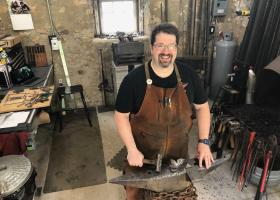Laturi in the smithy, a restored 1844 stone and mortar building.
