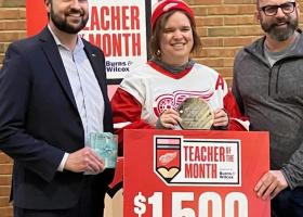 Valascho receiving the January Red Wings Teacher of the Month award at her school