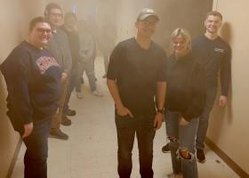 Students in a smoke-filled hallway prepare for role-playing duty (Chris MacMaster photo)