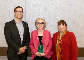 Boyer-Davis (middle) with President Brock Tessman and College of Business Dean Carol Johnson