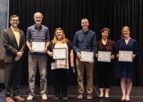 (From left) President Tessmen, John Bruggink and Jill Leonard-Biology, Adam Prus-Psychological Science, Janelle Taylor and Chelsey Sundberg-Grad Studies & Research. Not pictured:  Mlado Ivanovic-Philosophy, Amber LaCrosse-Psychological Science, Kim Larson-IACUC Team Member, Erich Ottem-Biology, Tesse Sayen-College of Graduate Studies & Research, Daniel Rowe-Mathematics & Computer Science, Dawn Sheffield-IACUC Team Member
