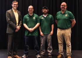 From left: President Tessman with Kevin Price, Bob Erspamer and Dave Weigand, all of Plant Operations. Not pictured: Rick Schwemin