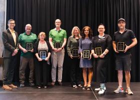 President Tessman with Excellence in Service Award winners Roo, Shaw, Cullen, Riipi, Koski, Hamari and Buckmaster. Not Pictured: Nicole Walton