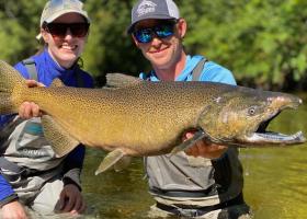 Ermatinger (right) with a client and her catch.