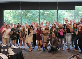 Aspire students and NMU staff students and NMU staff at an Aug. 16 Aspire dinner hosted by President Brock Tessman.