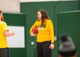 Student with a basketball