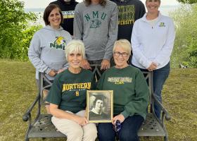 Pictured in the photo seated are Karen Baker Valot ‘75 and Joan Baker Kelley ‘72, holding a photo of mother Alice Westman Baker ‘38, taken on her graduation day. Standing are her grandchildren Alicia Valot Powers ‘08, Shawn Kelley ‘00, and Rebecca Kelley Valot ‘98. Incoming NMU students Jaren Valot and Noah Valot are continuing the family tradition.