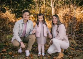 Brigitte (right), with wife Mariah and daughter Amya.