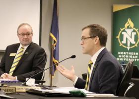 President Brock Tessman (right) and NMU Board Chair Steve Young