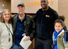 (From left): Lenette and Mark Pynnonen with Keven Hagans and his daughter