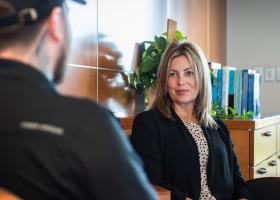 PMHNP assisting a patient (stock photo)