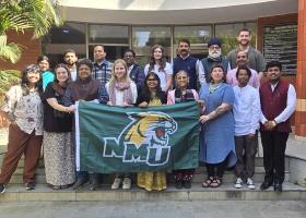 The NMU delegation with hosts in India
