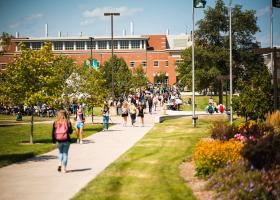 Students walking on campus (NMU stock photo)
