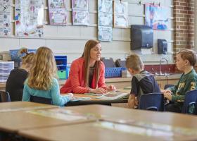 Early education teacher with students (NMU stock photo)