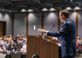 Tessman delivering his first convocation last year.