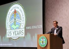 Tessman speaking at convocation
