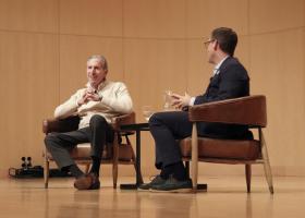 Howard Schultz (left) addresses students during a conversation moderated by President Brock Tessman