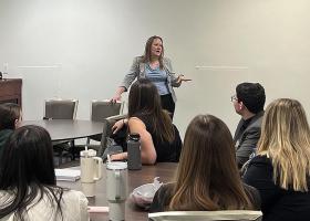 Hetrick (standing) meets with business students from Kent State University (B&W Enterprises LinkedIn photo)