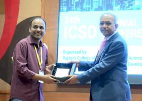 Kumar being recognized for his work with ICSD at the conference.