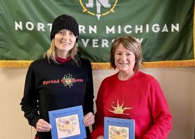 NMU alumna and Spread Goodness Day founder Anna Dravland (left) is pictured with NMU alumna Sue Meier, the coauthor of a children's book based on Dravland's story