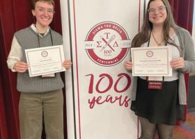 Erin O'Donnell (left) and Alexandria Bournonville are pictured with their awards at the Sigma Tau Delta national conference in Pittsburgh