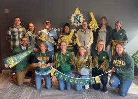 President Tessman and NMU Foundation staff show their Wildcat spirit on Giving Day