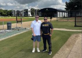 Athletic training master's student Dillon Makela (left) and alumnus Alex Mena at a baseball complex in the Dominican Republic.
