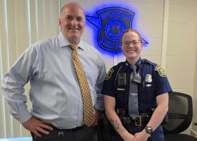 NMU instructor Christopher MacMaster with NMU grad and current MSP Trooper Jenna Leway