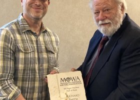 Drew YoungeDyke of MOWA presented Smith with a plaque for the Hall of Fame Induction.