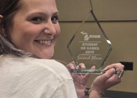 Emmalee Artibee (captain and alternate) with the second-place award