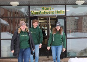 Students on campus in winter (stock photo)