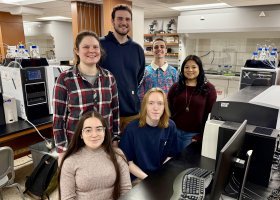 Maris Cinelli, standing left, with her team of "alkaloid hunters" (clockwise from Cinelli's right): Ian Grochowski, Joey Diviny, Ishani Sharma, Tyler Watson and Sabrina Mata.