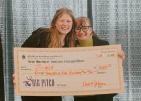 ZiTech founder Maya Van Berkum (left) with the $3,500 Big Pitch grand prize ceremonial check presented by College of Business Dean Carol Johnson.