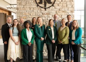 Front row (from left): Delany Frank, Outstanding Graduating Senior; Trustees Venus Joy Brown, Missie Holmquist and Lisa Fittante; Halle Johnson, Outstanding Graduating Senior; and Laura Clarkston, Outstanding Global Campus student. Back row (from left) Trustees Greg Toutant, Steve Lindberg, Brigitte LaPointe-Dunham and Greg Seppanen; President Chris Olsen. Not present: Adam Nesbit, Summer Morrison and Dan Atkins.