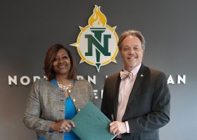Bay College President Nerita Hughes and NMU President Chris Olsen